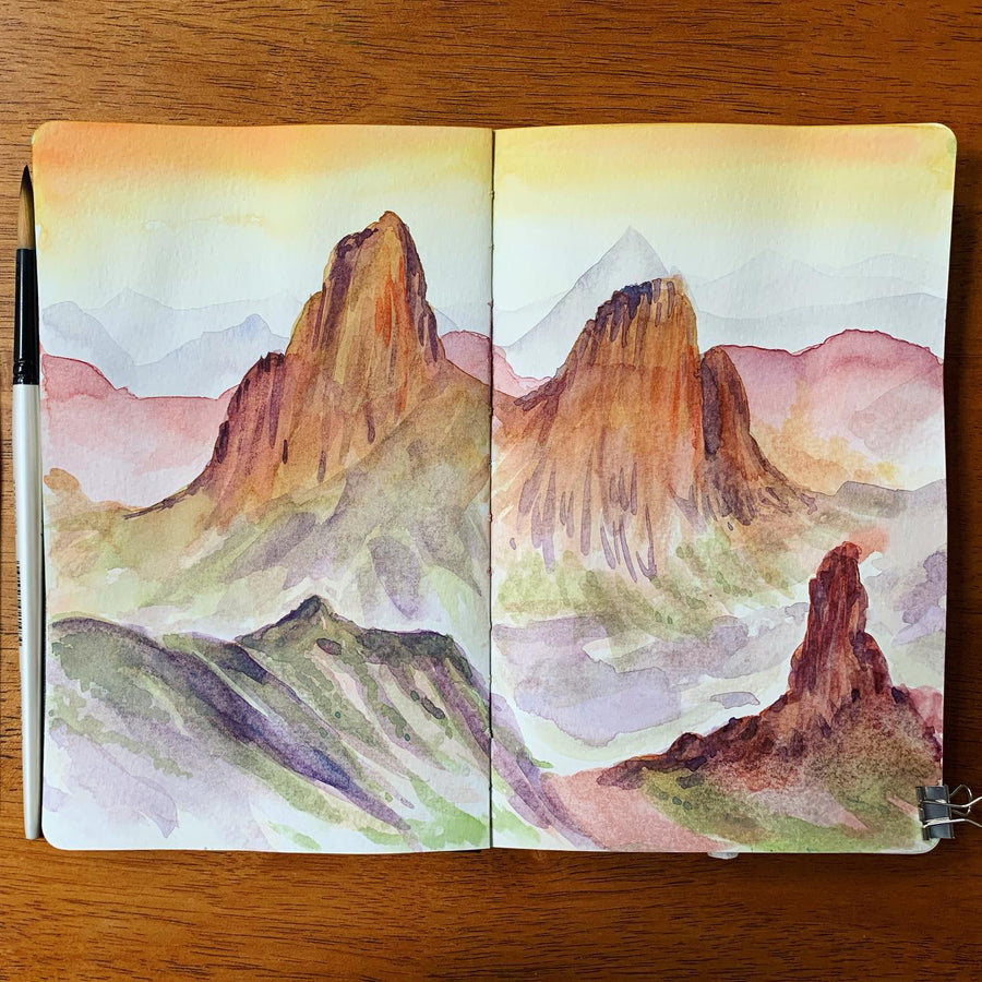 sketchbook watercolor of red rock canyon spires
