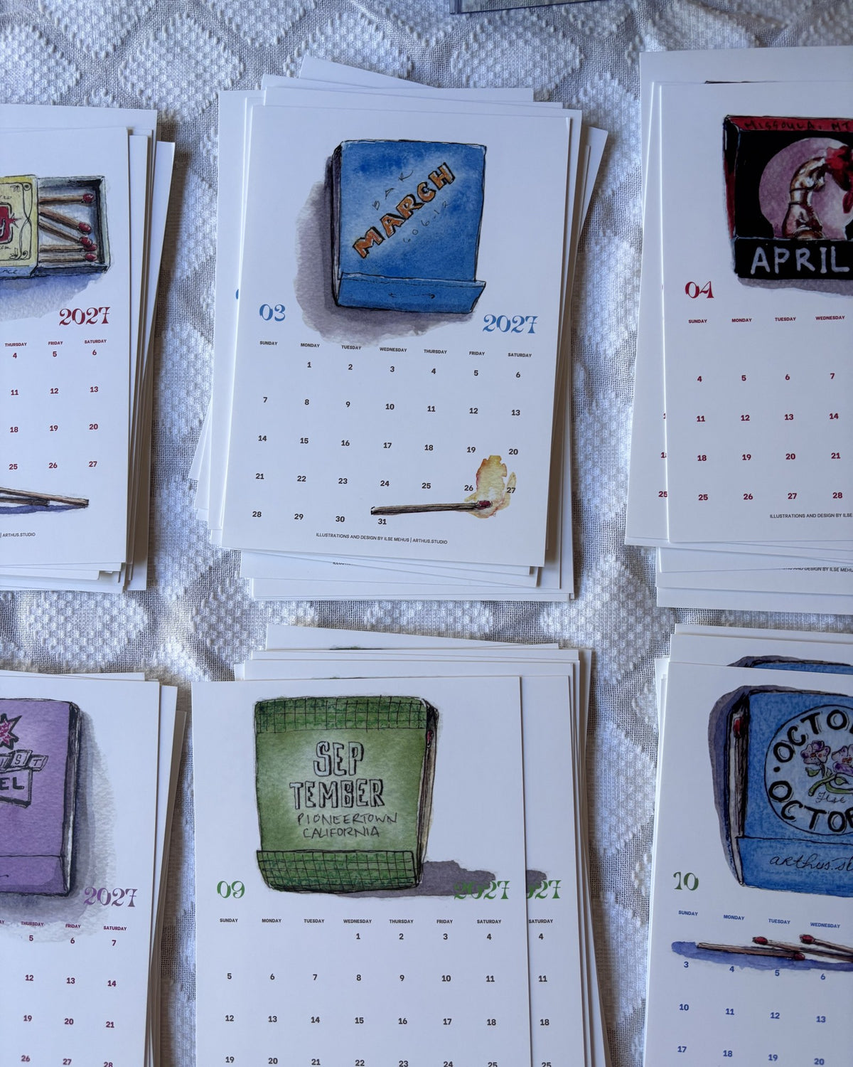 printed 2027 calendar postcards for march, april, september and october, watercolor and ink matchbooks