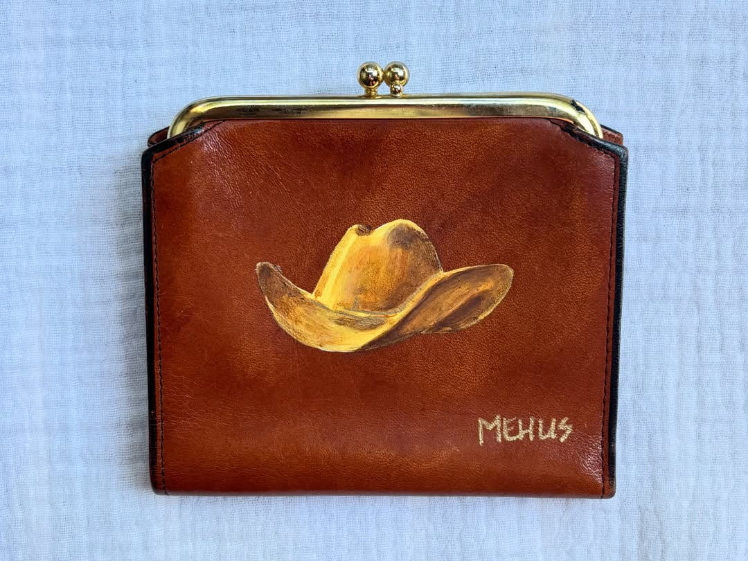 golden cowboy hat hand-painted on a vintage brown buxton leather kiss-lock wallet