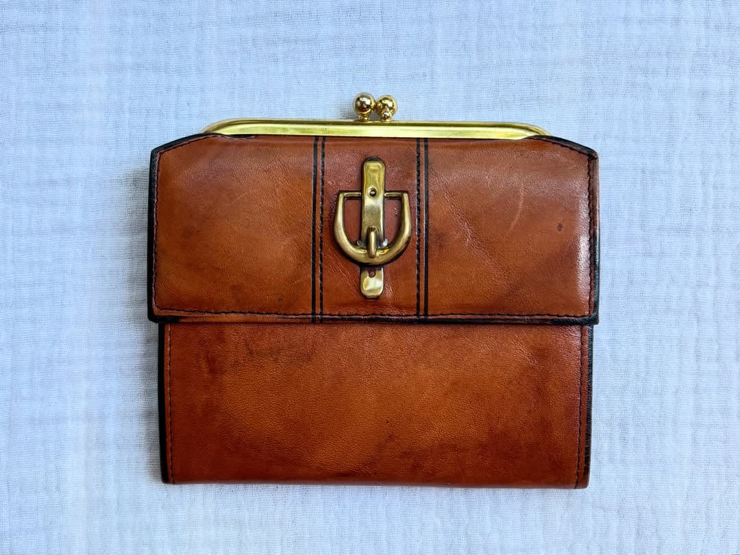 golden cowboy hat hand-painted on a vintage brown buxton leather kiss-lock wallet — detail