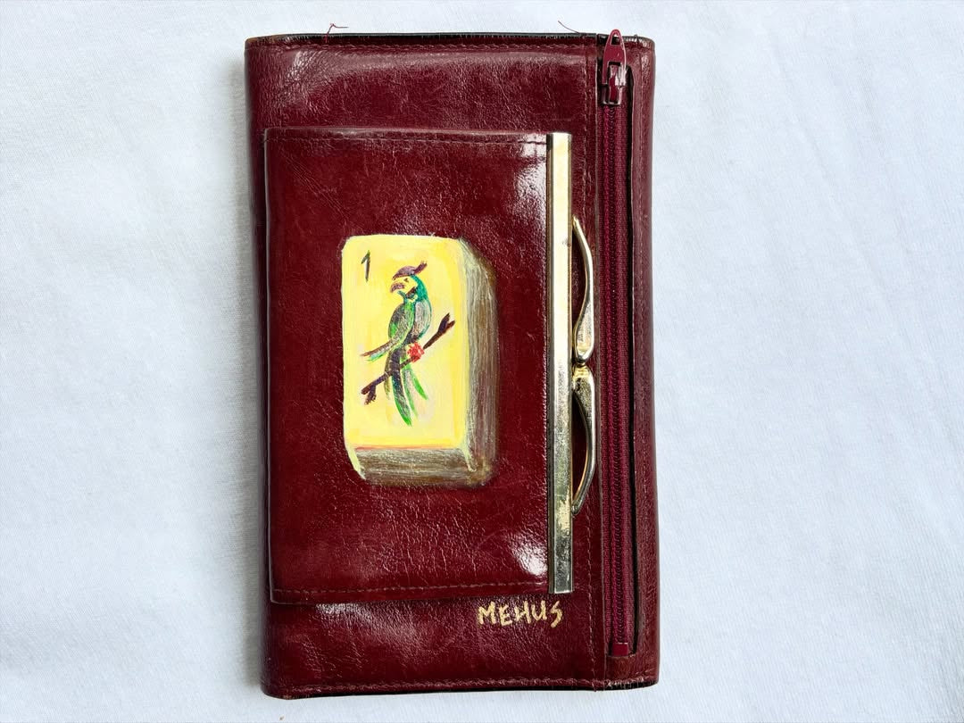 bamboo mahjong tile hand-painted on a vintage oxblood rolfs leather wallet