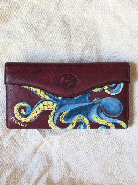 octopus hand-painted on a vintage marbled burgundy buxton leather wallet, a custom commission — detail
