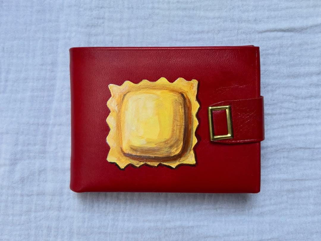 ravioli hand-painted on a vintage red meeker leather wallet