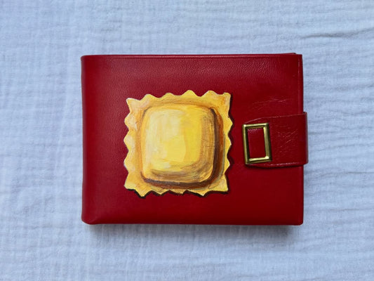 ravioli hand-painted on a vintage red meeker leather wallet