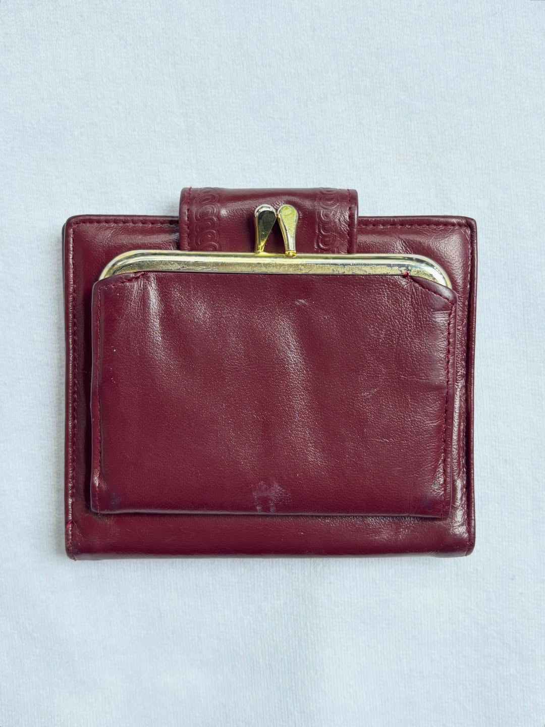 wine glasses and a bottle hand-painted on a vintage burgundy buxton leather wallet — detail
